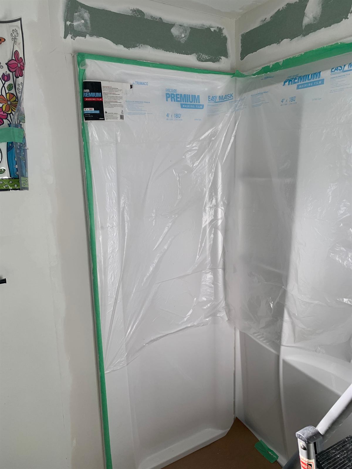 Professional site prep, dust containment, and rough-in framing for a bathroom remodel