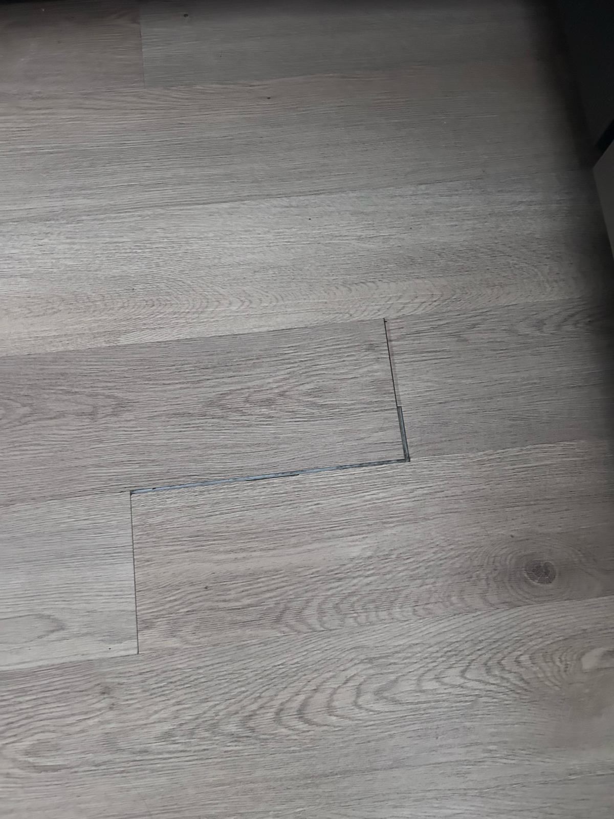 Seamless luxury vinyl plank (LVP) and hardwood flooring installation for a clean, modern look